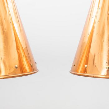 A pair of 1950s hand hamered copper ceiling pendants ES Horn Alestrup Denmark.