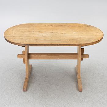 A pine wood table, folk art, 19th century.
