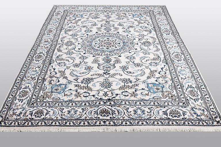 A carpet, Nain, 285 x 196 cm.