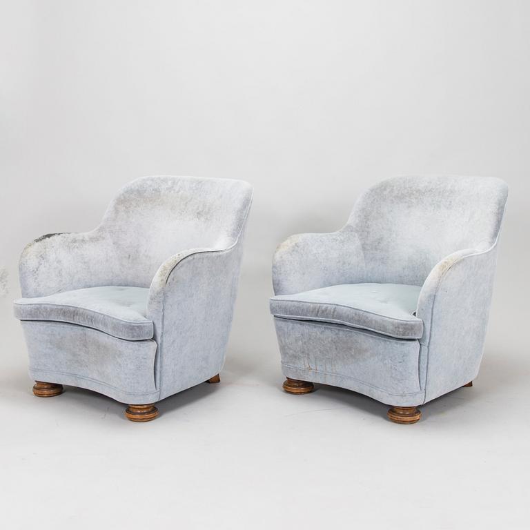 A pair, ofmid-20th century armchairs.