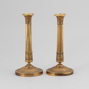 A pair of candlesticks, empire style.