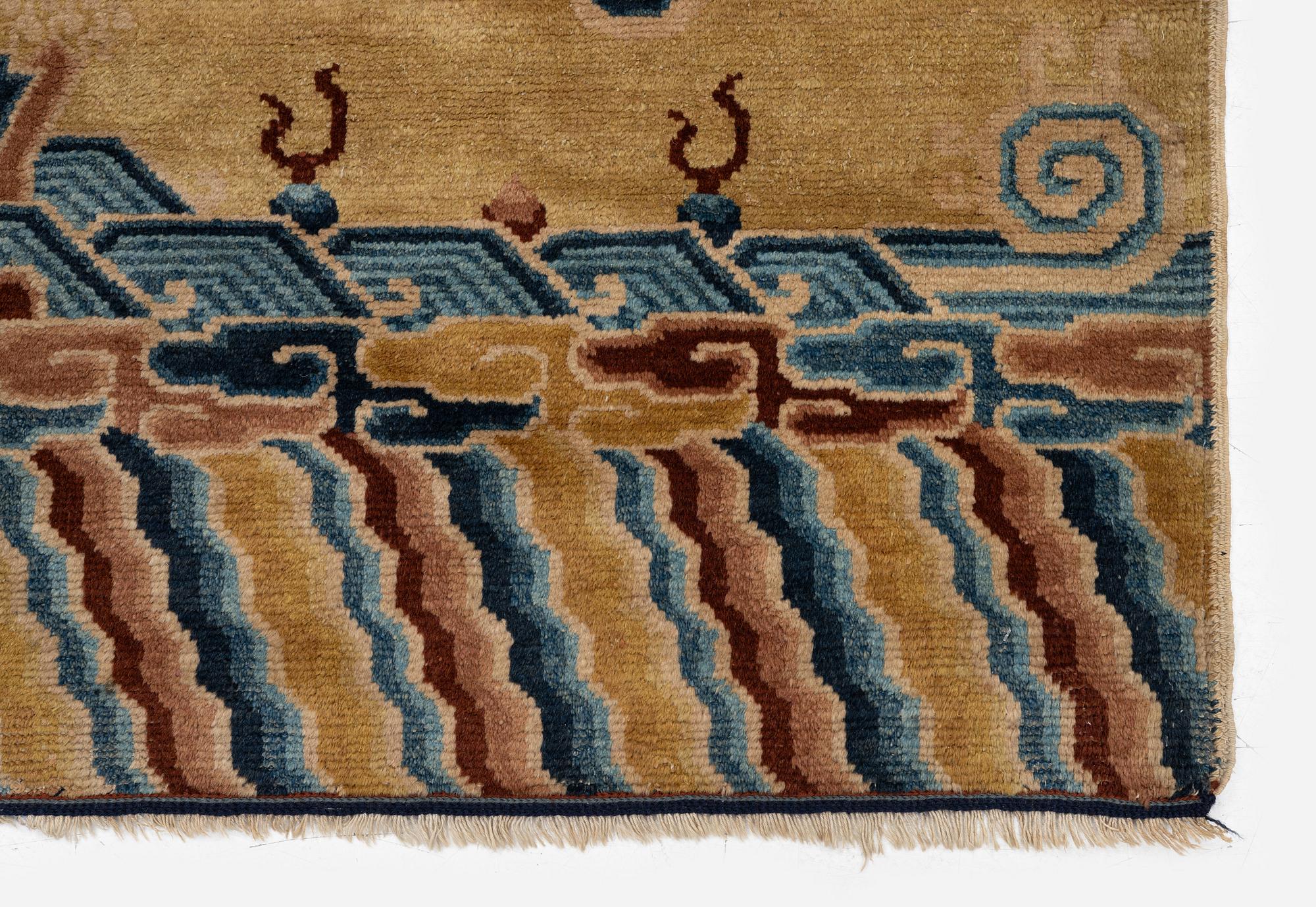 An Antique Ningzia Temple carpet, Northern China. c. 208-131 cm.