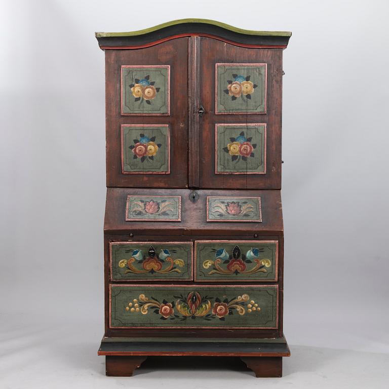 A painted 19th Century folk art bed cabinet.