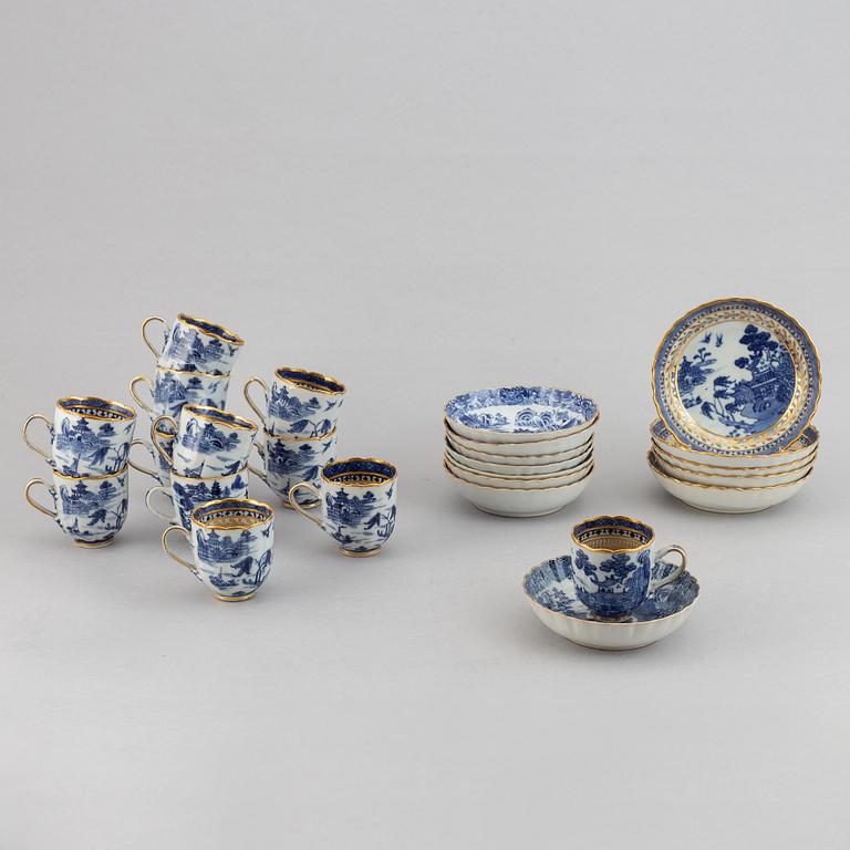 A group of 12 blue and white export porcelain cups with 13 saucers, Qing dynasty, Qianlong (1736-95).