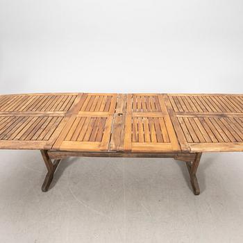 A 9 pcs stained teak garden suite by Brafab around 2000.