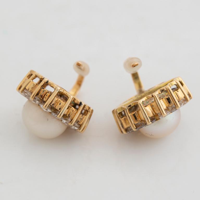 Cultured pearl and brilliant cut diamond earrings.