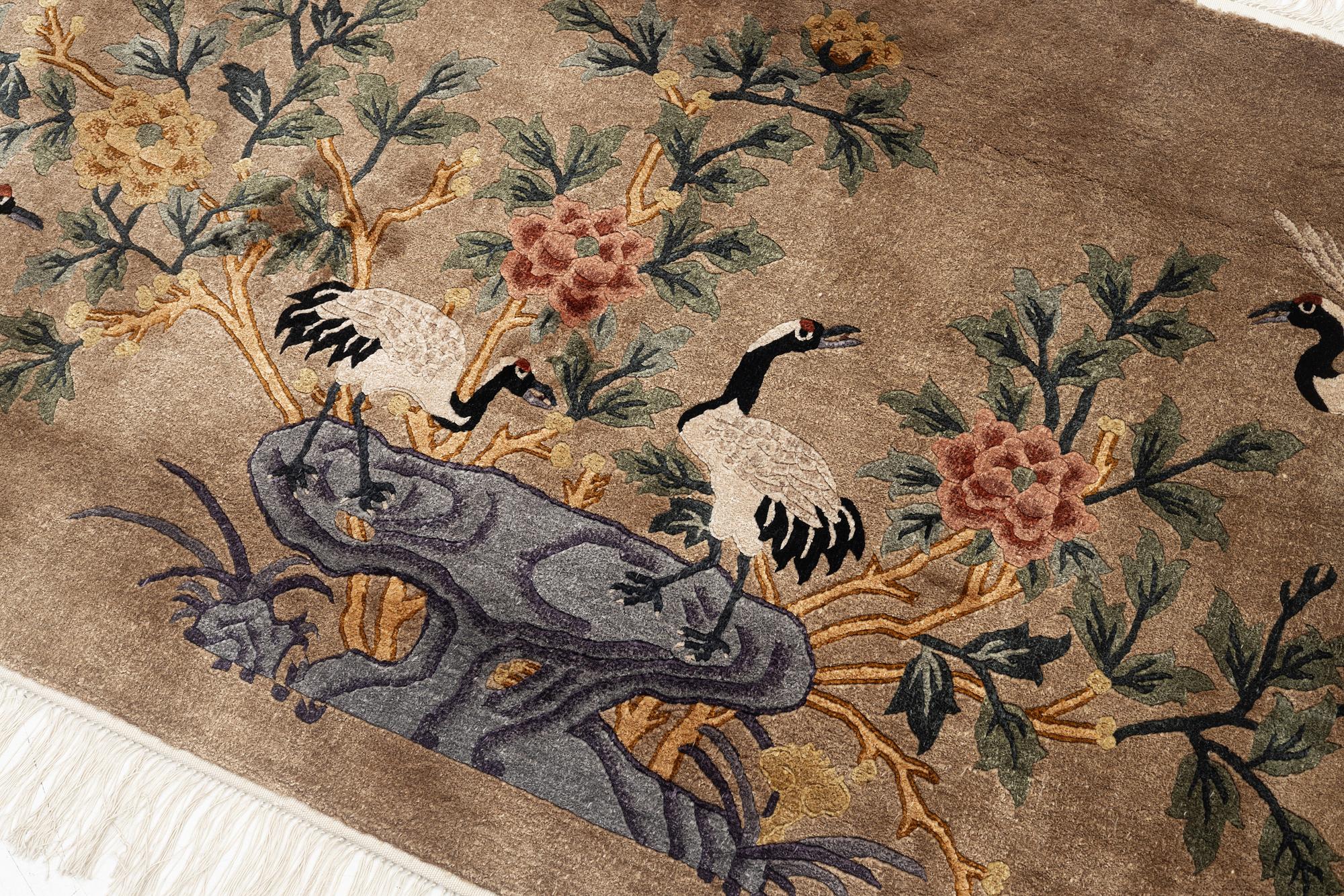 A silke figural rug, China, later part of the 20th century, ca. 92 x 170 cm.