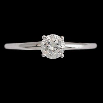 RING, 14 k vitguld, solitär briljantslipade diamant ca 0.50 ct.