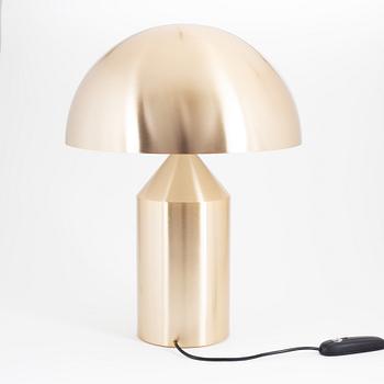 An 'Atollo - gold' table lamp by Vico Magistretti for Oluce, designed before 1977.