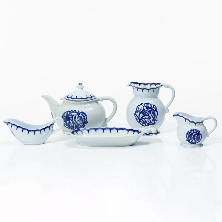 Wilhelm Kåge, 35 pieces of a 'Liljeblå' service, Gustafsberg, Sweden, 1918-1936.
