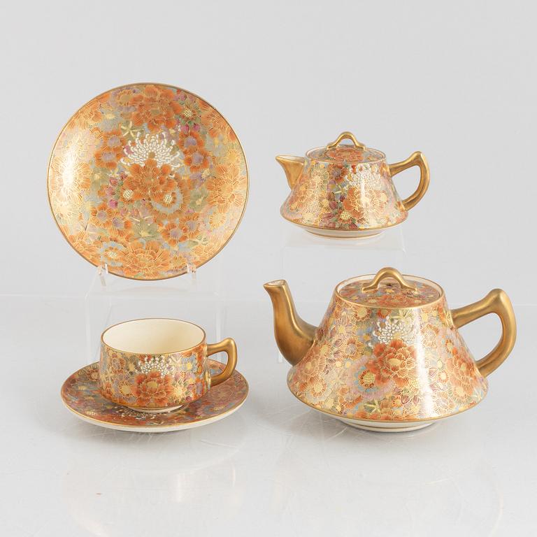 A Japanese satsuma ware teaservice, 10 pieces, 20th century.