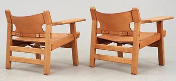 A pair of Børge Mogensen oak and leather 'Spanish chairs', Fredericia stolefabrik, Denmark.