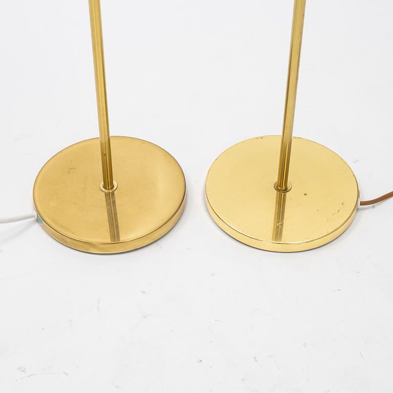 A pair of brass floor light from Möller Armatur, second part of the 20th Century.