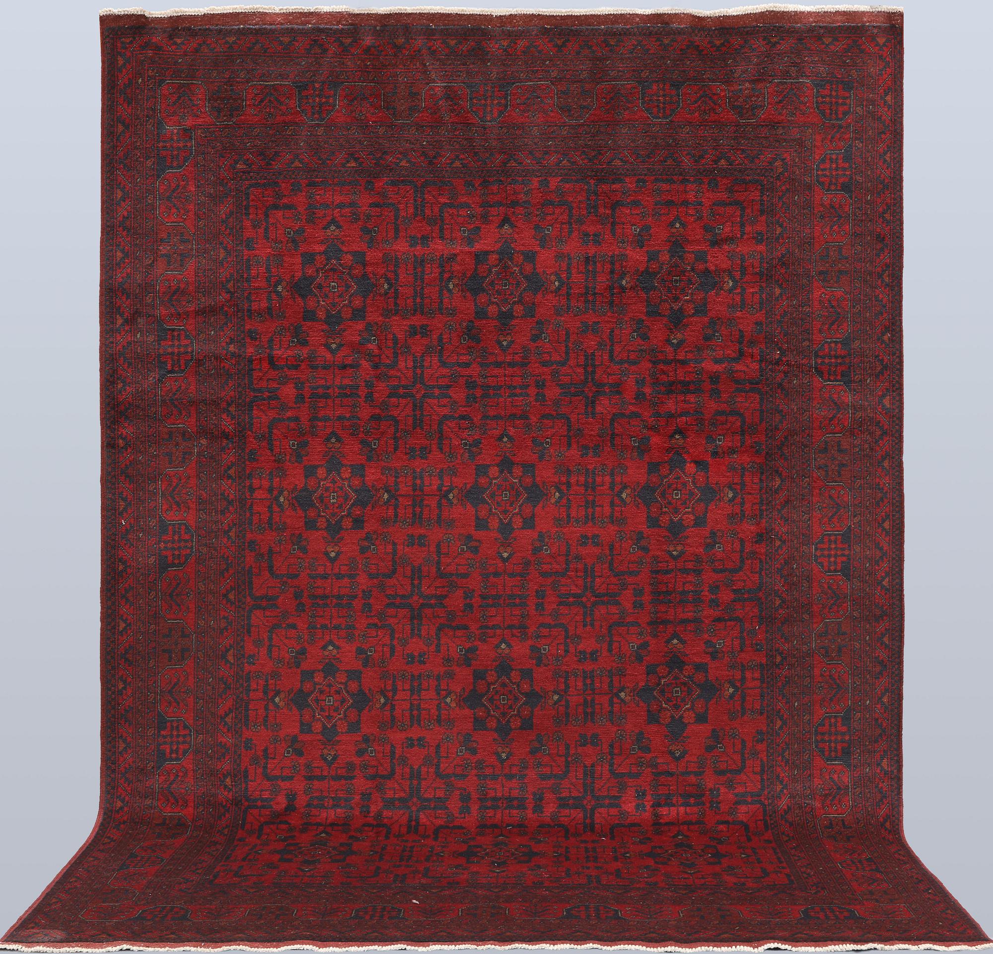 A Afghan fine carpet, 297 x 205 cm.