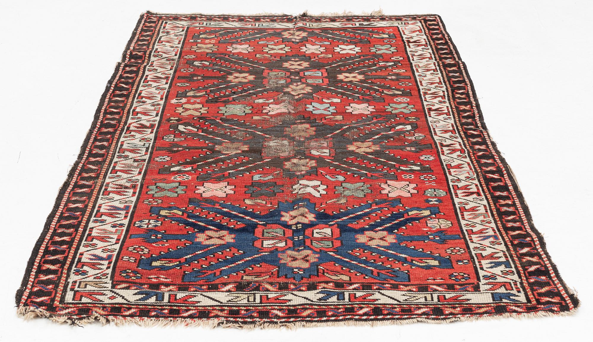Rug, "Sunburst", Kazak, circa 250 x 137 cm.