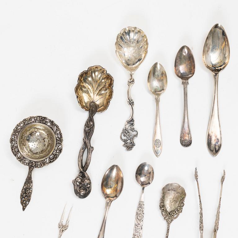 A set of silver cutlery and napkin rings, including with mark of Th Marthinsen, Tönsberg, Norway (14 pieces).