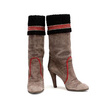 YVES SAINT LAURENT, a pair of grey suede boots.