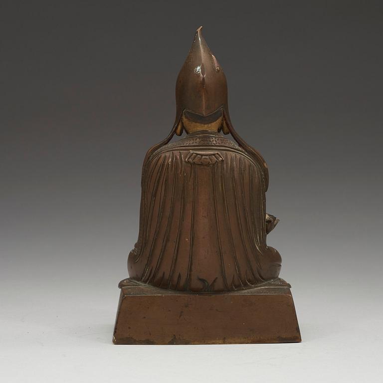 A seated bronze figure of a Lama, Sino-Tibetan, 18th/19th  Century.