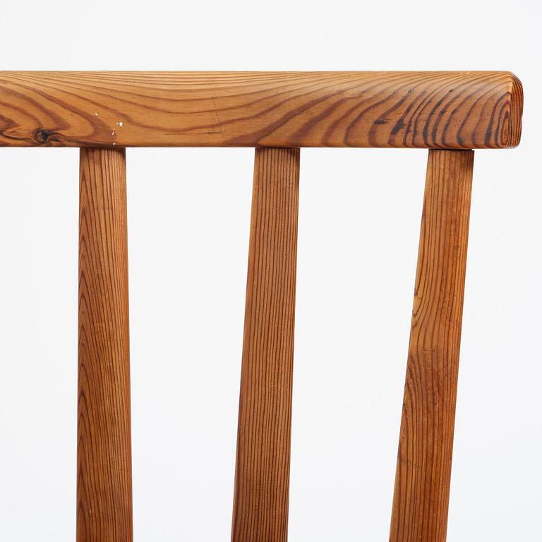 Axel Einar Hjorth, a set of six stained pine "Utö" chairs, Nordiska Kompaniet, Sweden, 1930s.