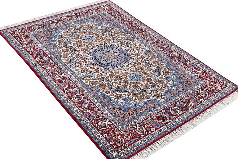 An Esfahan rug, part silk, figural, c. 243 x 158 cm.