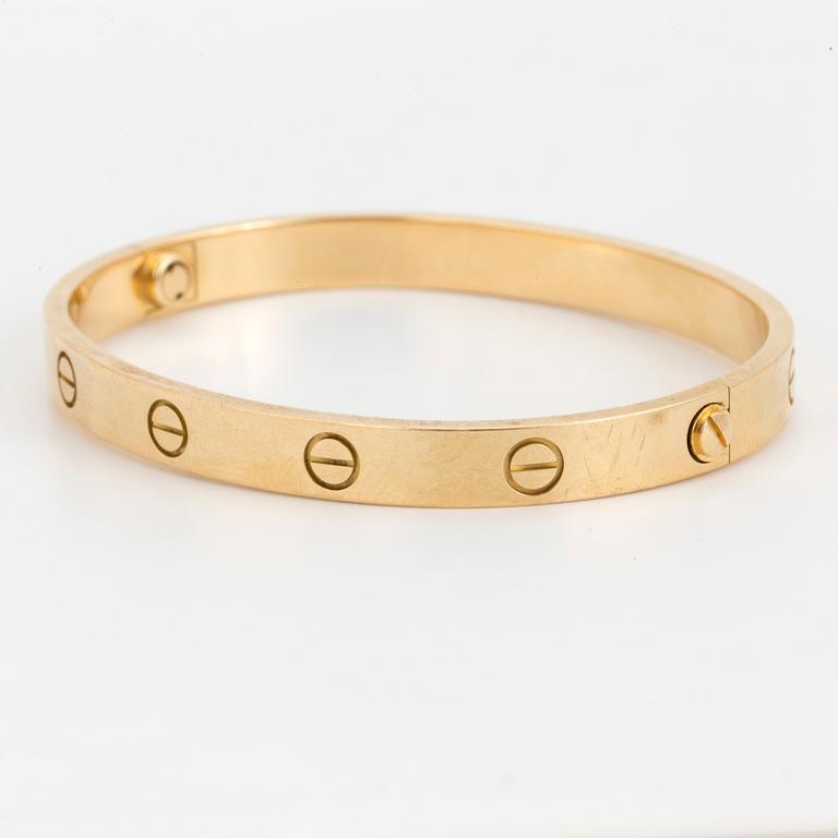 An 18K gold Cartier 'Love' bangle.