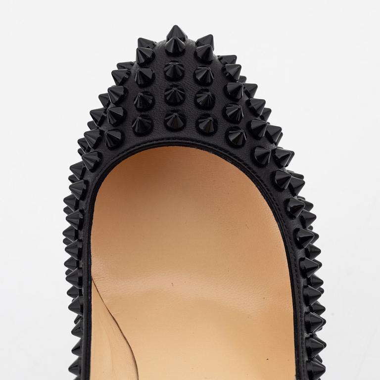 Christian Louboutin, a pair of black leather and studs pumps, size 36 1/2.