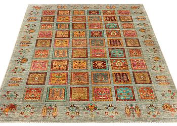 A Ziglar carpet a. 279 x 210 cm.