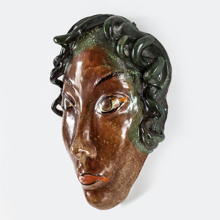 ALLAN EBELING, an earthenware decorative mask from Torshälla, signed.