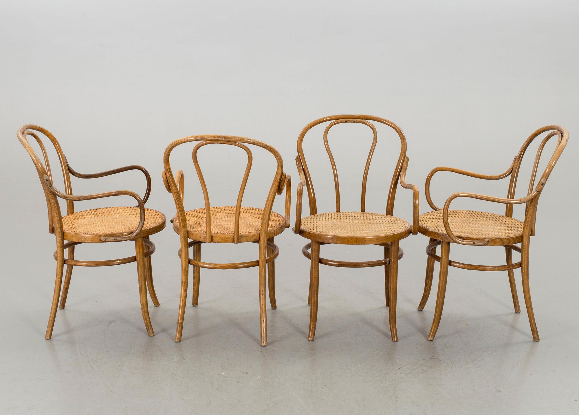 A SET OF 6 BENTWOOD ARMCHAIRS.