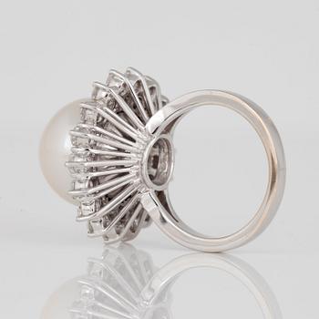 A cultured South Sea pearl and diamond ring.