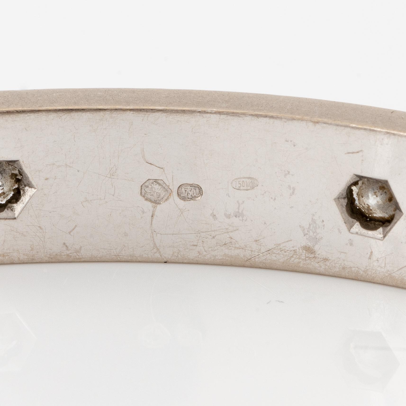 Cartier armband " Love" 18K vitguld med tio runda briljantslipade diamanter.