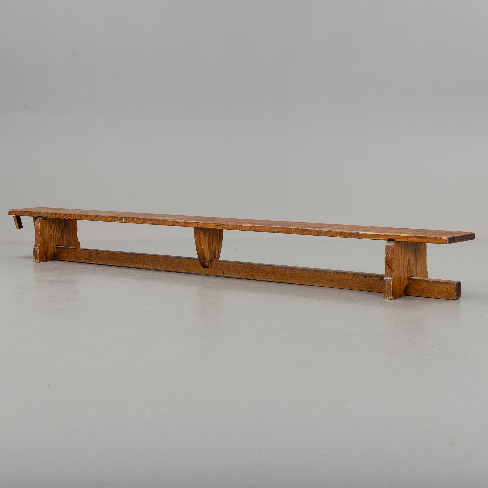 A first half of the 20th century pine bench.