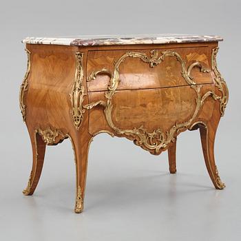 A Louis XV-style commode late 19th century.