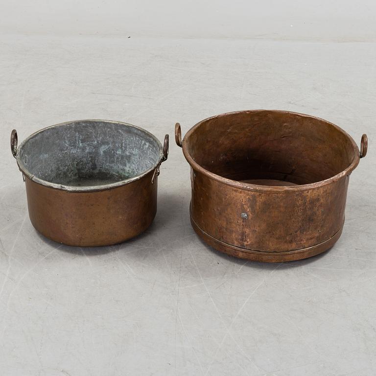 two copper pots from the 19th century.