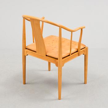 A Hans J Wegner 'Kinastolen' armchair, Fritz Hansen, Denmark 1971.