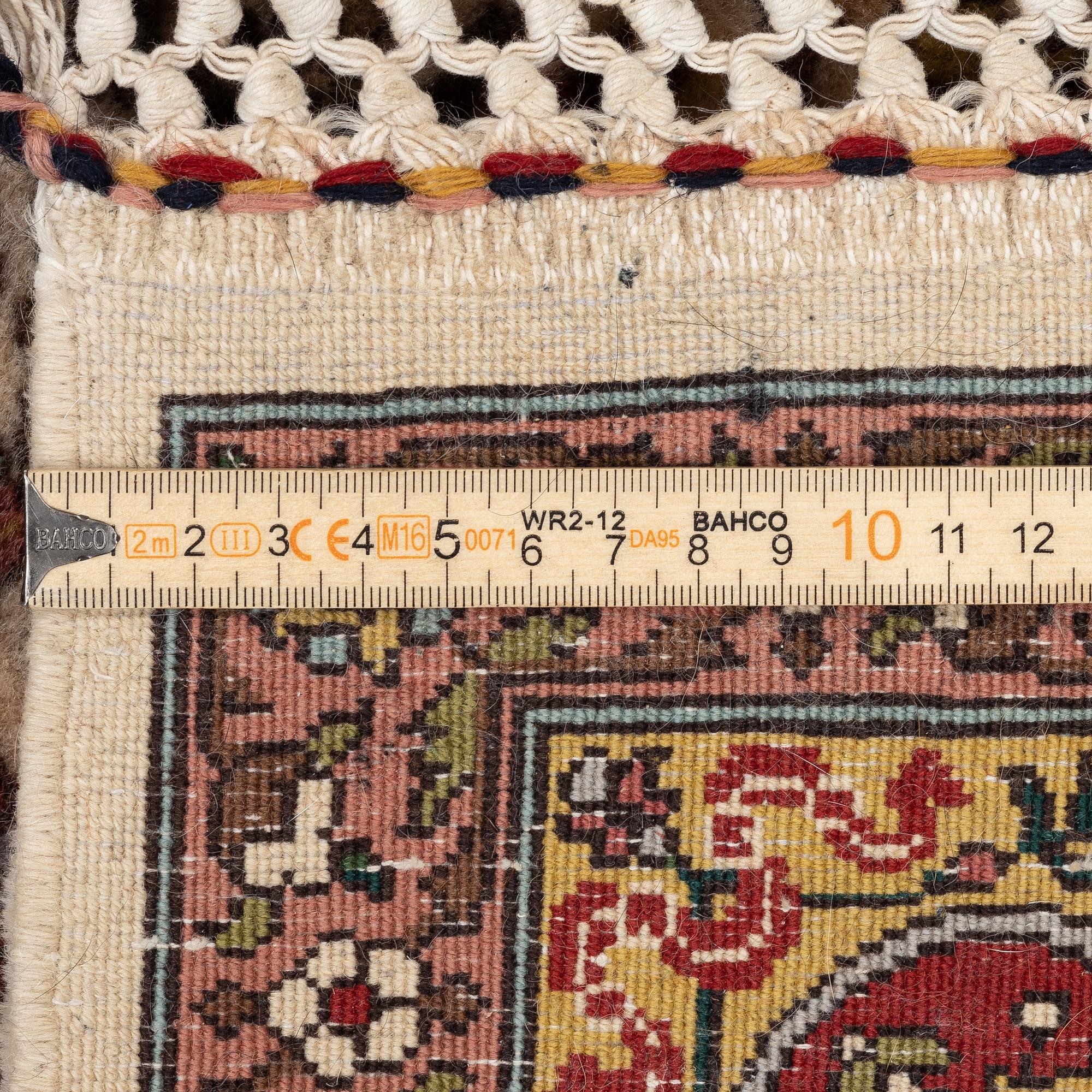 A semi-antique Lahore rug, north India, c 220 x 159 cm .