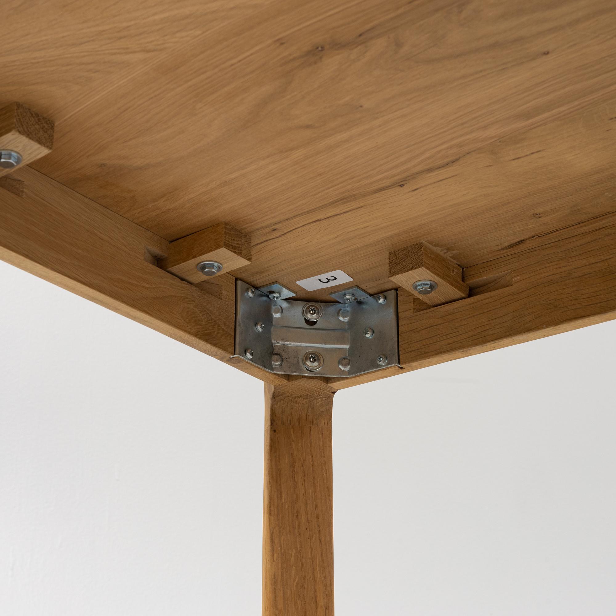A dining table, Ethnicraft, 21st Century.