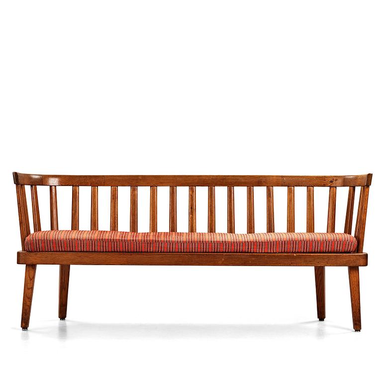 Axel Einar Hjorth, a stained pine version of "Utö" sofa, Nordiska Kompaniet, Sweden 1930's.