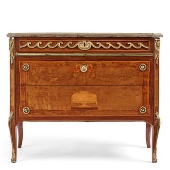 A Gustavian marquetry, ormolu-mounted and limestone-top commode by Georg Haupt (master in Stockholm 1770-84).