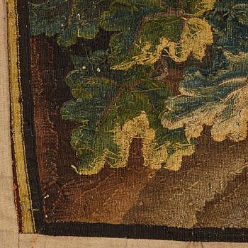 A tapestry, "Verdure", tapestry weave, a so called "entre-fenêtre", ca 295-296 x 126-129,5 cm, signed M.R.DABVSON.i.D.