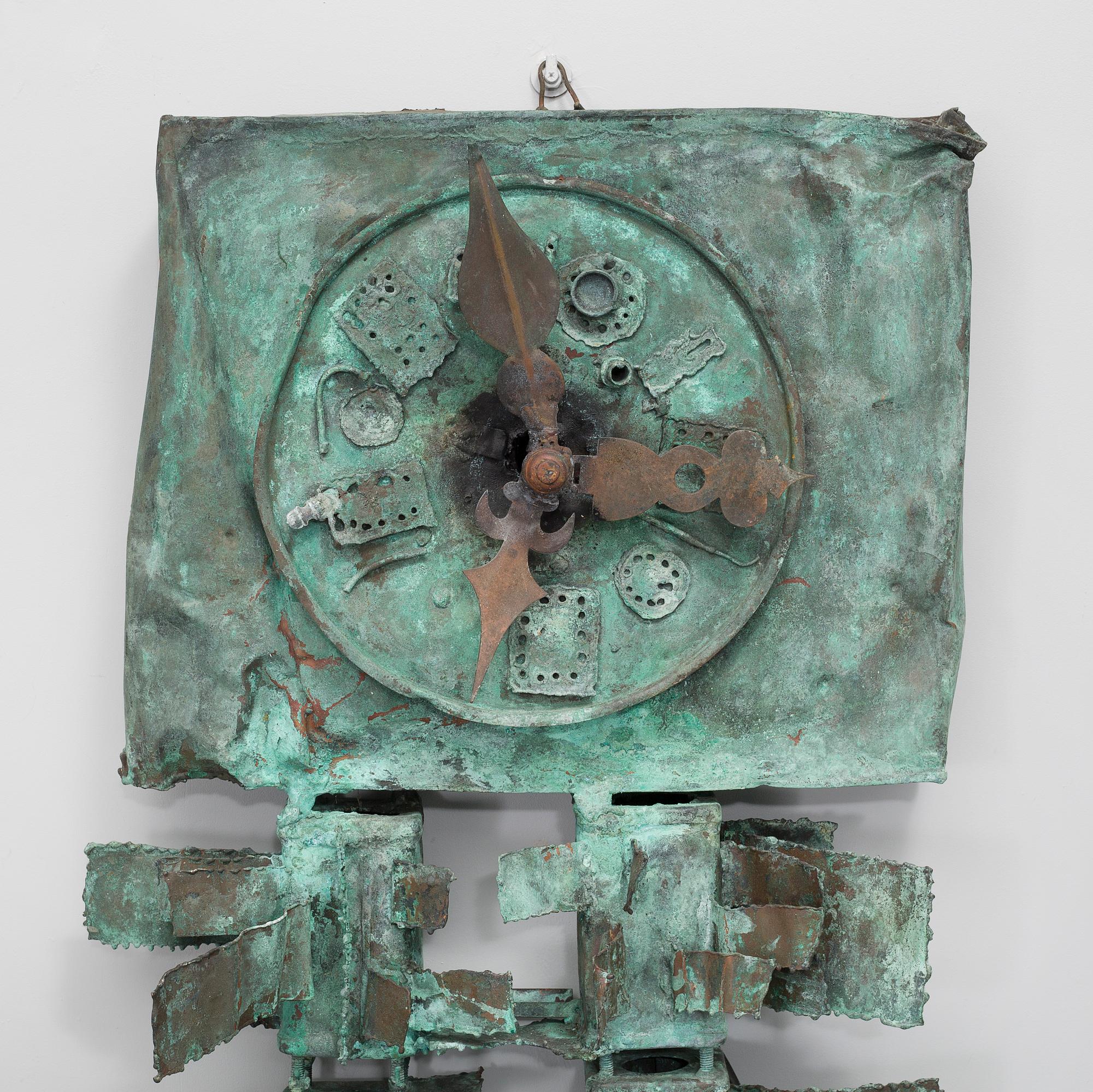 a patinated metal sculpture,
