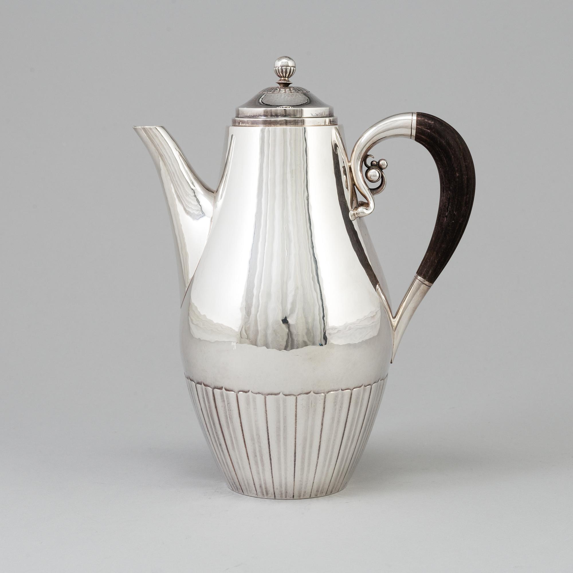 A silver coffee pot, designed by Johan Rodhe for Georg Jensen, Denmark, after 1945. Weight ca 647 grams.