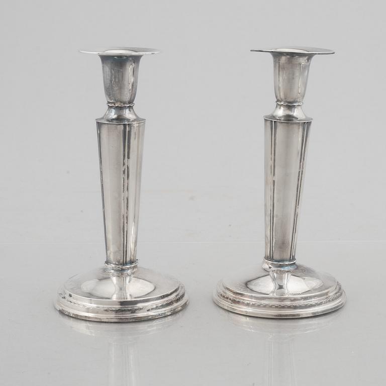 Two pairs of Swedish silver candlesticks, including TESI, Gothenburg 1961.