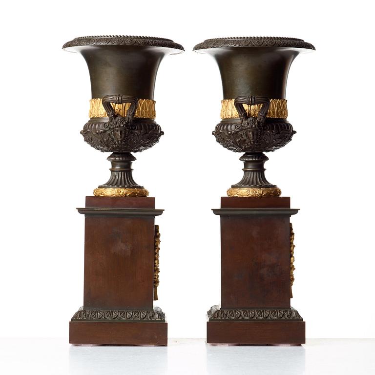 A pair of French Empire early 19th century urns.