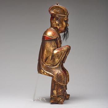 A large wooden sculpture of a Daoist dignitary, Qing dynasty, 17/18th Century.