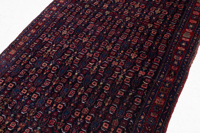 A semi-antique Bidjar carpet, c. 310 x 145 cm.
