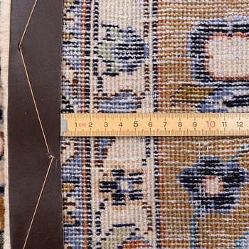 A Najafabad carpet, c. 350 x 237 cm.