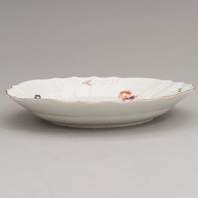 Two Meissen porcelain vases, a platter, an urn and a lidded box from the latter half of 20th century.