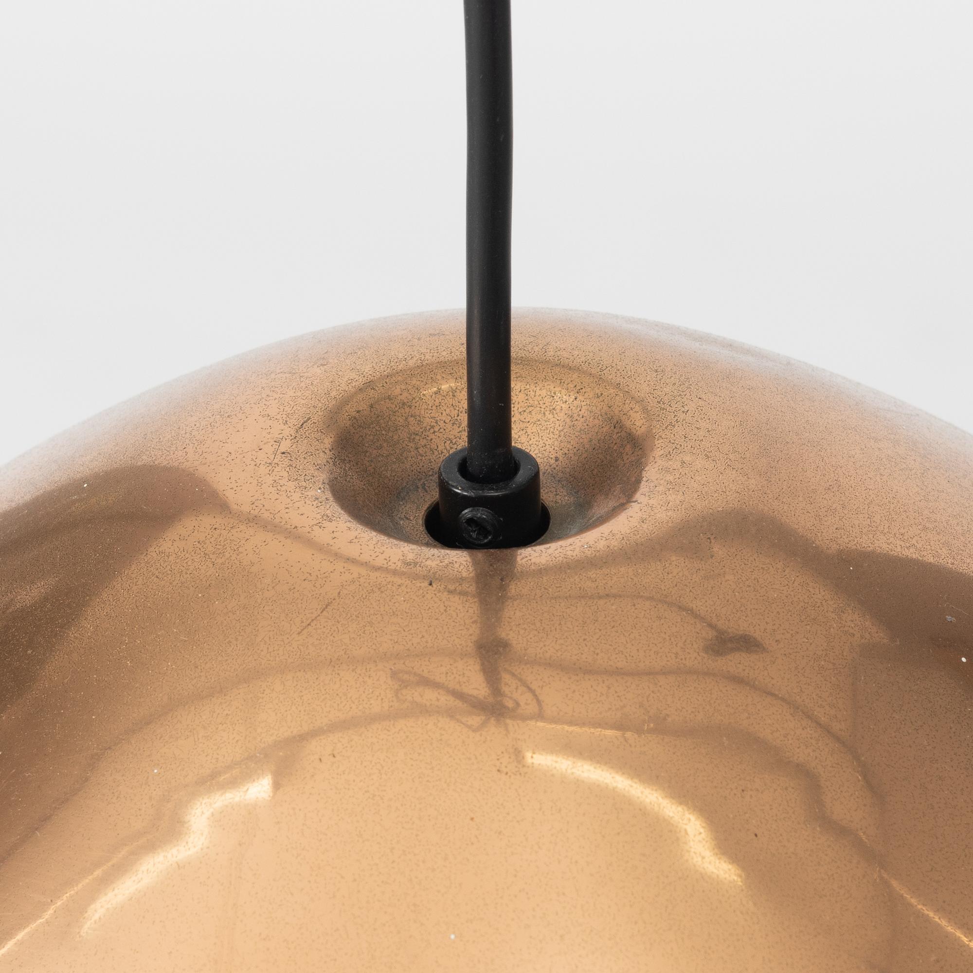 Tom Dixon, a 'Bell' ceiling lamp.
