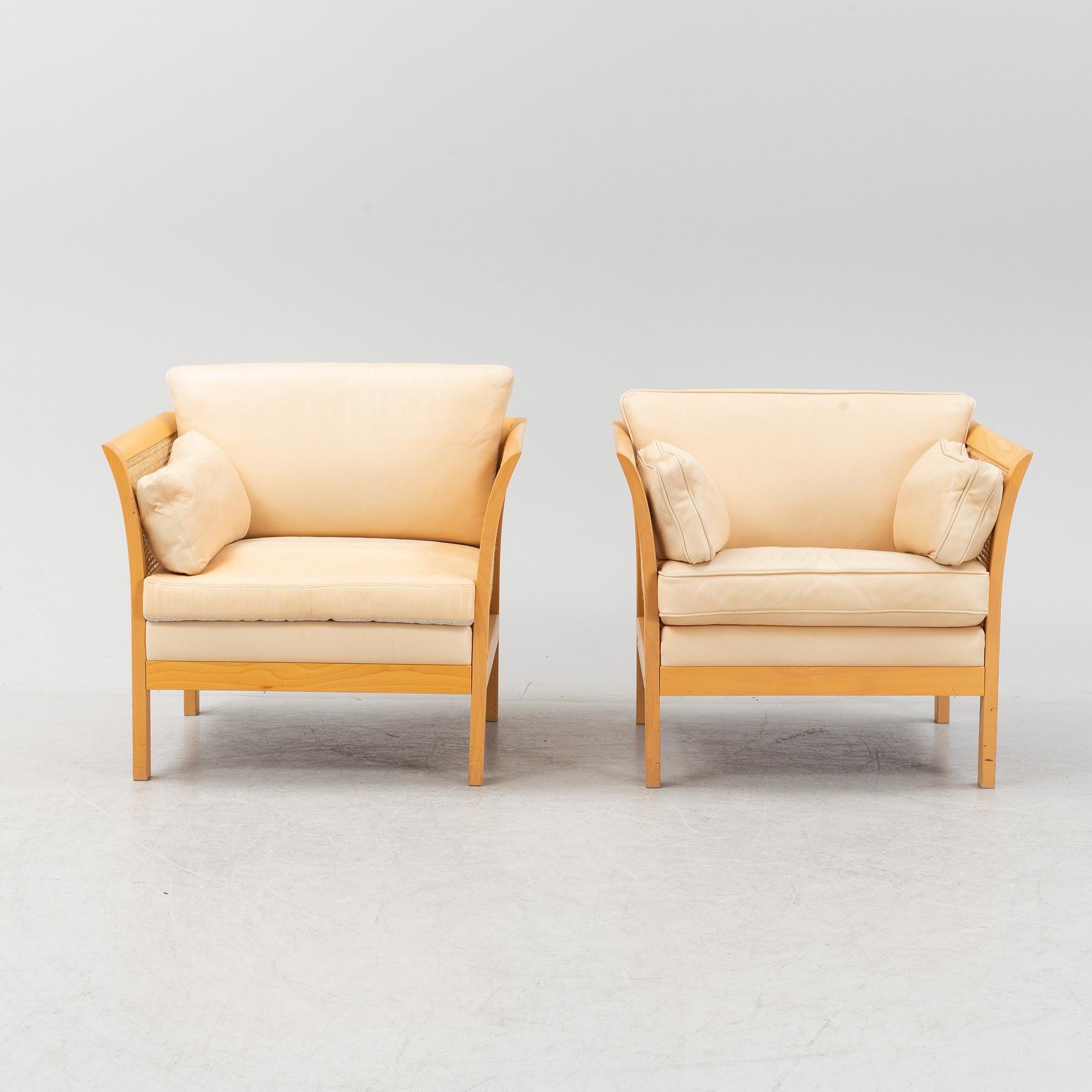 A pair of 'Rotan' easy chairs by Arne Norell, end of the 20th Century.